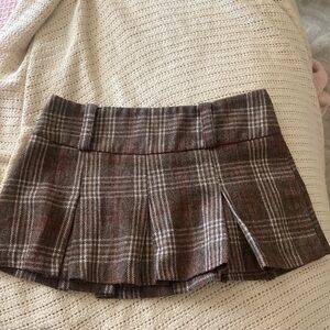Vintage papaya pleated skirt, low rise, and like new.